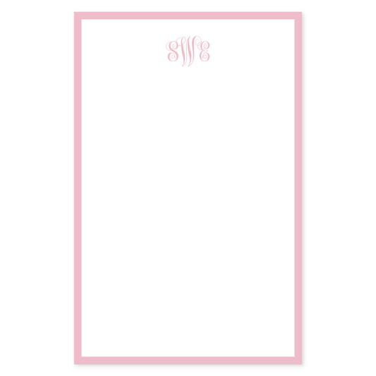 Notepad page with a soft blush pink border and a delicate monogram design at the top, offering a timeless and elegant style for personalized stationery.