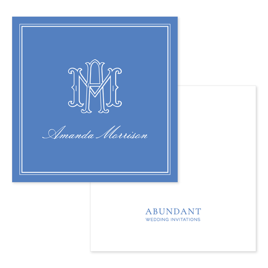 Elegant personalized calling card featuring a classic monogram and name in white on a cobalt blue background with a simple border design.