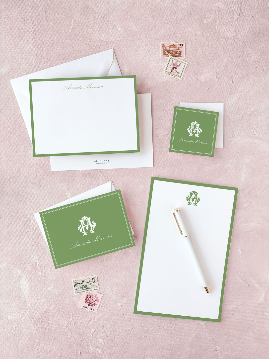 Personalized classic green stationery set featuring a notepad, note cards, and envelopes with elegant monogram and border accents.