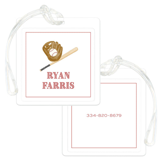 Square bag tag with baseball glove and bat illustration, personalized with a name on one side and a phone number on the other, featuring a clear strap for attachment.