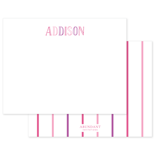 White flat notecard featuring personalized pink chalkboard-style lettering at the top and a striped pink pattern on the back with a subtle logo.