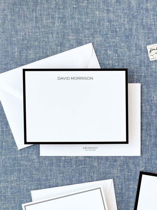 Elegant personalized flat notecard with a classic black border and clean, minimalist design, styled for timeless stationery use.