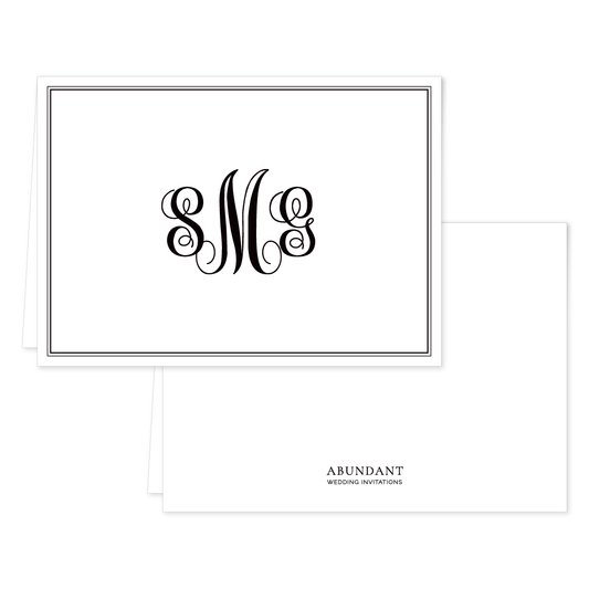 Elegant folded notecard featuring a classic black monogram design on a white background with a thin black border, personalized stationery ideal for weddings or events.