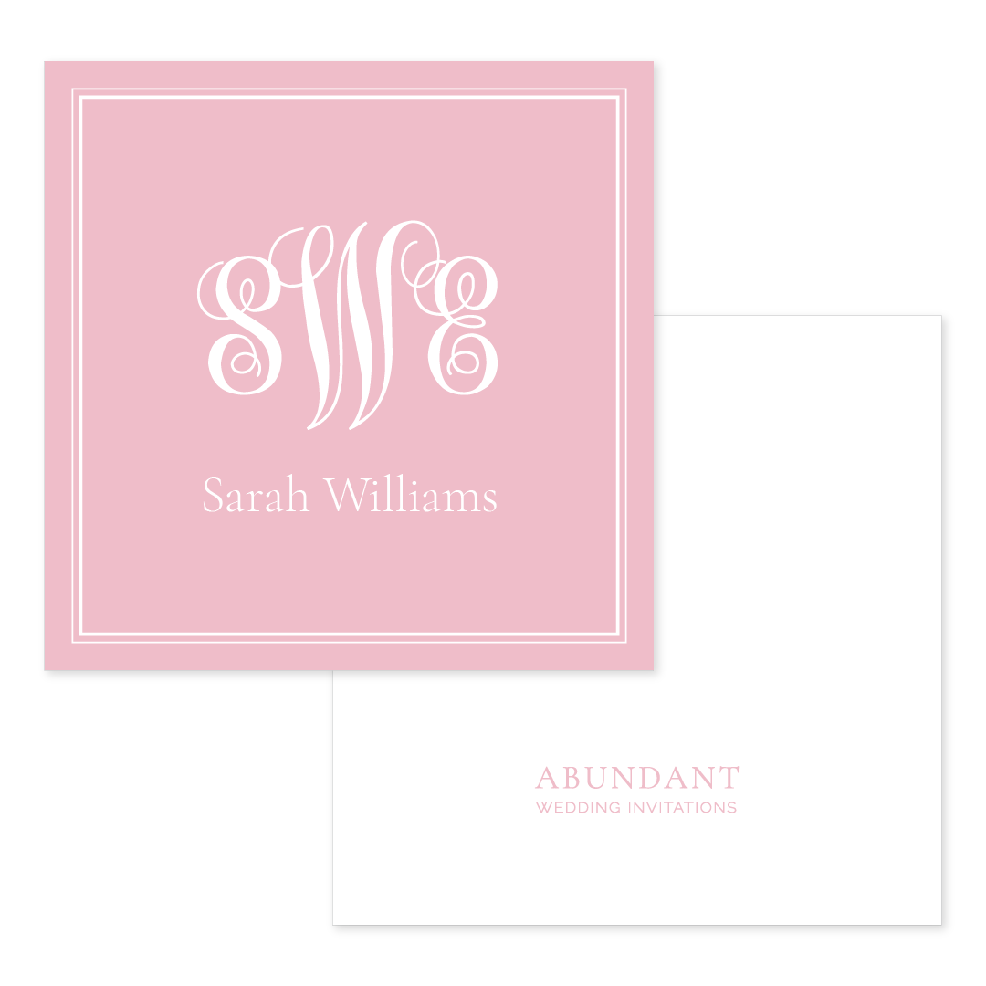 Square blush pink calling card with elegant white script monogram and personalized name, paired with a white envelope featuring subtle blush branding.