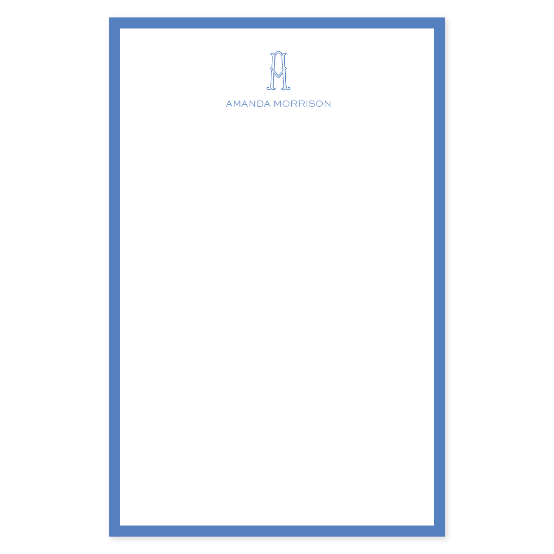 Notepad with a classic cobalt blue border and personalized elegant monogram and name at the top, featuring a clean, minimalist design.