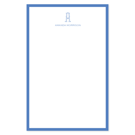 Notepad with a classic cobalt blue border and personalized elegant monogram and name at the top, featuring a clean, minimalist design.