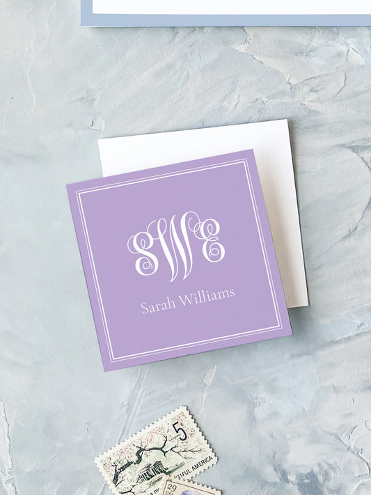Square lavender calling card with elegant white monogram and personalized name on textured background