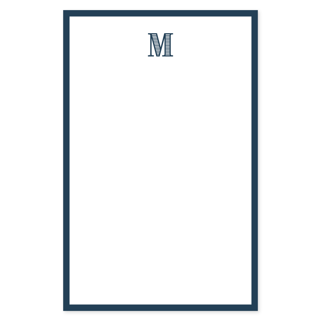Notepad with a classic navy border and a navy striped monogram letter M at the top, featuring a clean and timeless design perfect for personalized stationery.