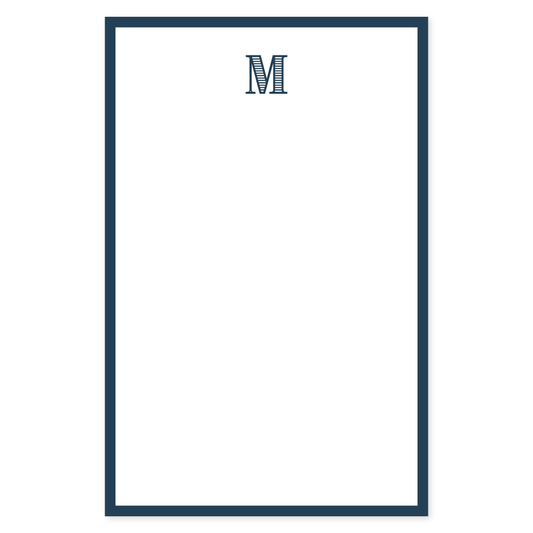 Notepad with a classic navy border and a navy striped monogram letter M at the top, featuring a clean and timeless design perfect for personalized stationery.