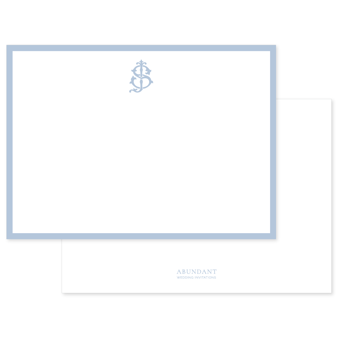 Flat notecard featuring a pale blue border and a classic monogram design, showcasing timeless personalized stationery style.