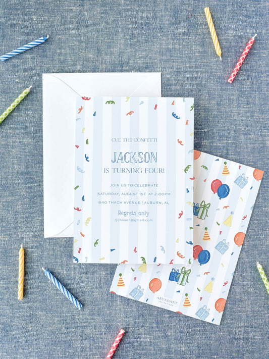 Colorful birthday invitation cards with confetti and party-themed illustrations on a blue fabric background