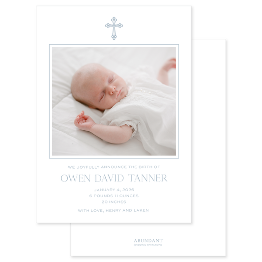 Baby blue birth announcement newborn photo and vintage cross on white paper