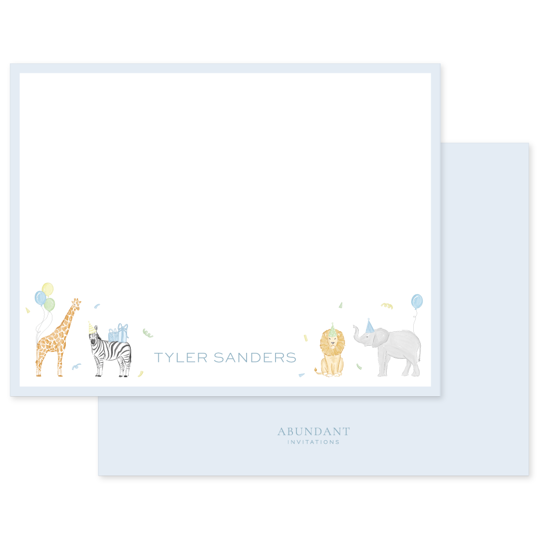 Blue flat notecard featuring watercolor illustrations of a giraffe, zebra, lion, and elephant with balloons and personalized name text.