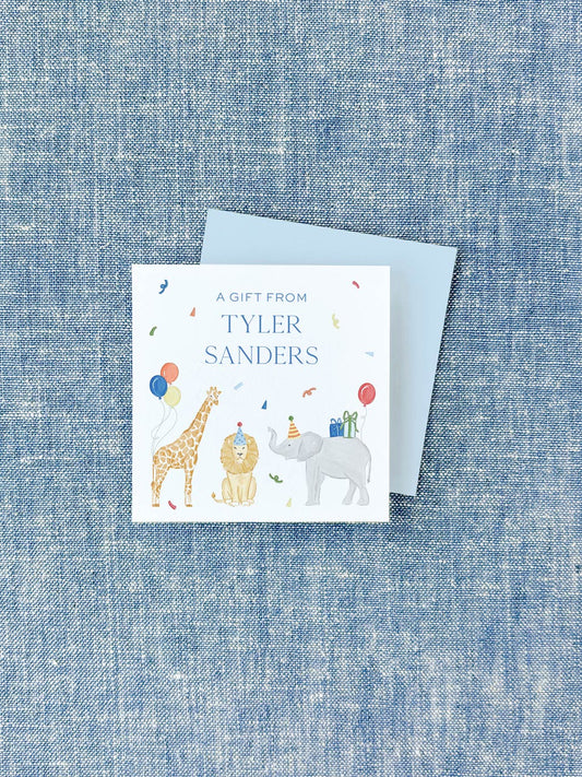 Colorful personalized calling card featuring watercolor illustrations of a giraffe, lion, and elephant wearing party hats with balloons and gifts on a textured blue background.