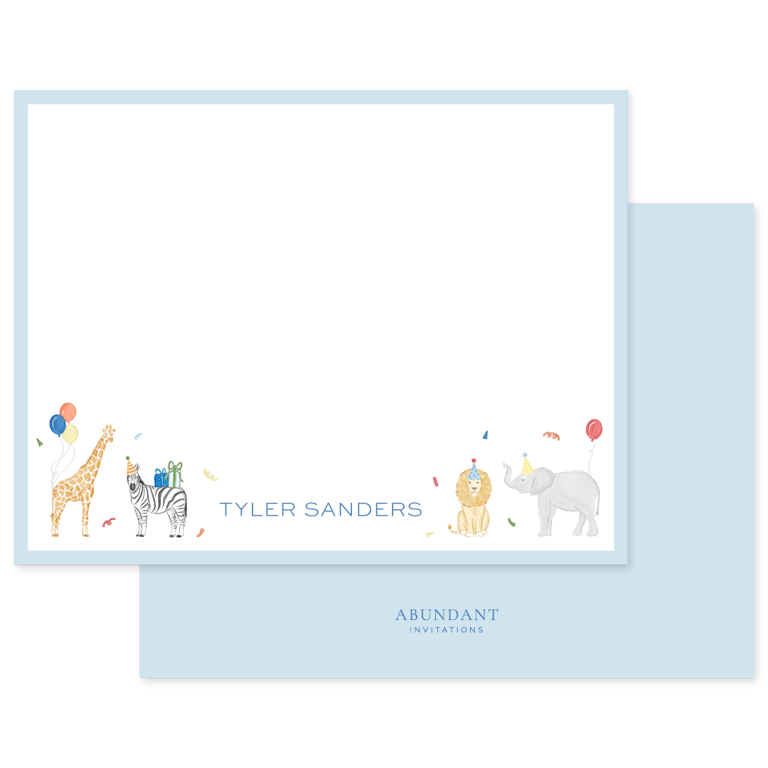 Light blue bordered flat notecard featuring watercolor illustrations of a giraffe, zebra with gifts, lion, and elephant wearing party hats, with personalized name and scattered confetti.