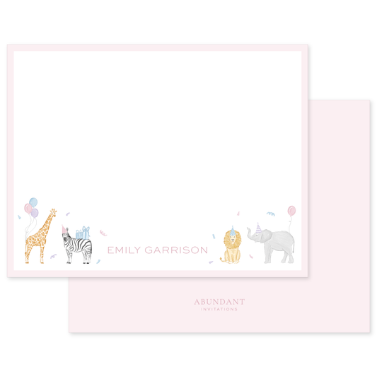 Notecard with soft pink border featuring illustrated party animals including a giraffe, zebra, lion, and elephant wearing party hats, with personalized name in elegant pink text at the bottom center.