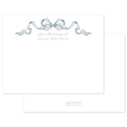 Elegant personalized notecard featuring a delicate blue watercolor bow and customizable nursery text, perfect for timeless stationery.