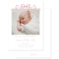 Birth announcement with a newborn baby photo with pink ribbon and script name on a white background